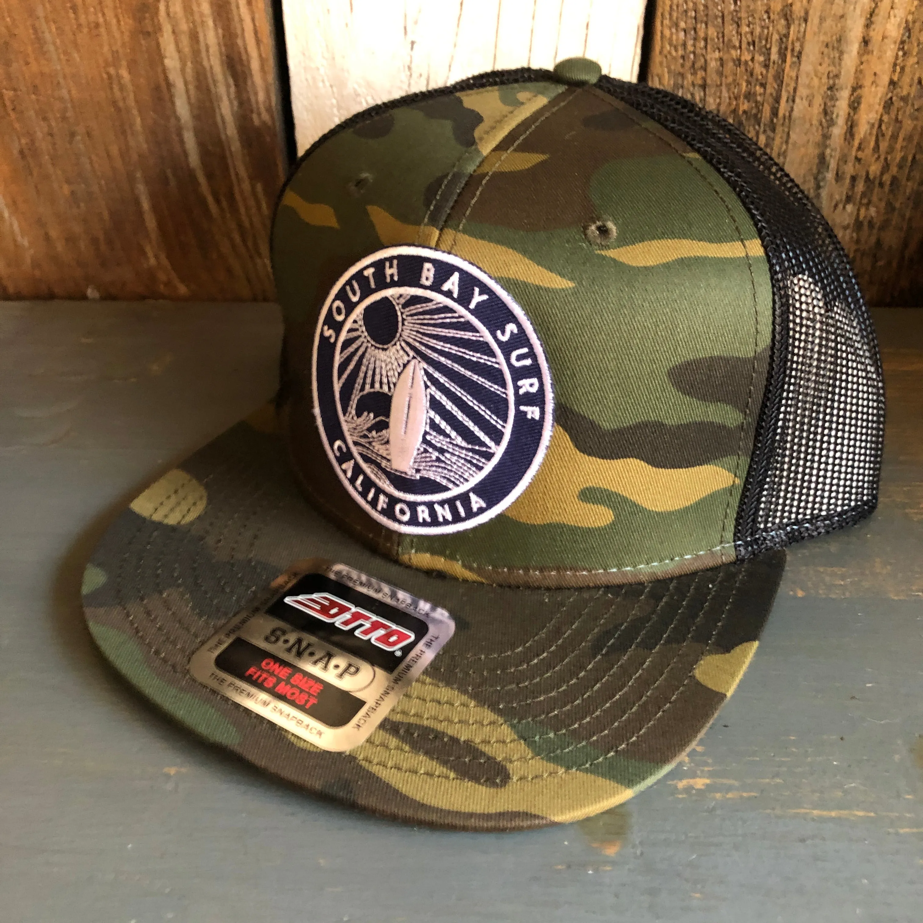 Hermosa Beach SOUTH BAY SURF (Navy Patch) Camouflage 6 Panel Mid Profile Mesh Back Snapback Trucker Hat - Dark Green/Brown/Black